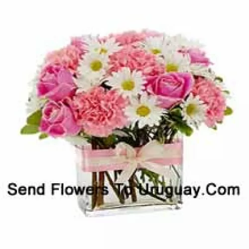 Pink Roses, Pink Carnations And Assorted White Seasonal Flowers Arranged Beautifully In A Glass Vase