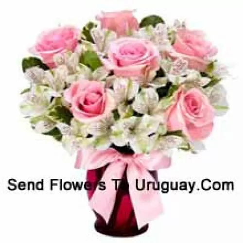 Pink Roses And White Alstroemeria Arrannged Beautifully In A Glass Vase