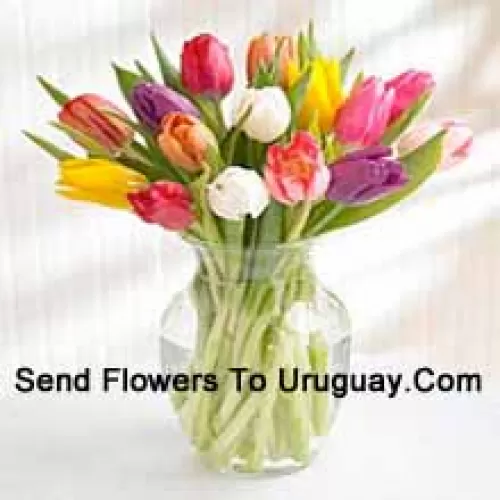 Mixed Colored Tulips In A Glass Vase - Please Note That In Case Of Non-Availability Of Certain Seasonal Flowers The Same Will Be Substituted With Other Flowers Of Same Value