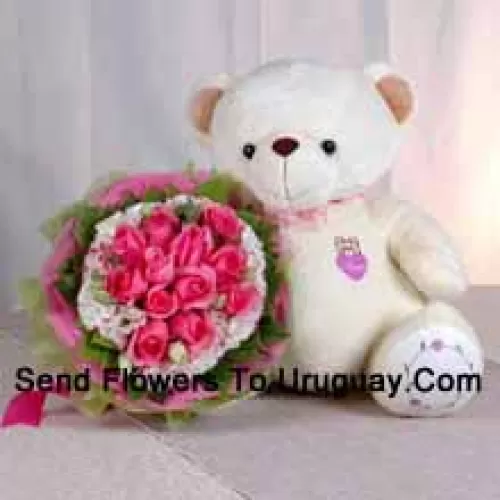 Botte de 12 roses roses et un ours en peluche de taille moyenne mignon