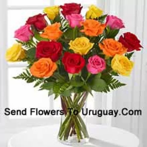 18 Mixed Colored Roses With Seasonal Fillers In A Glass Vase