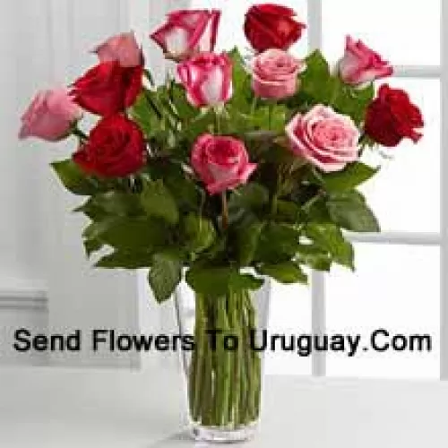 4 Red, 4 Pink And 4 Dual Toned Roses With Seasonal Fillers In A Glass Vase