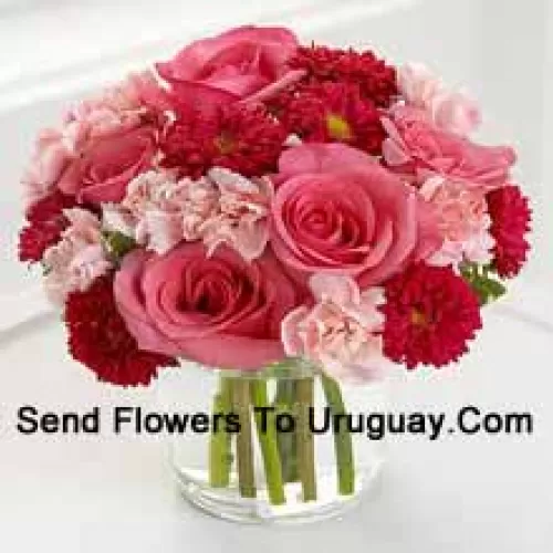 6 Pink Roses, 10 Red Colored Daisies And 10 Pink Colored Carnations In A Glass Vase